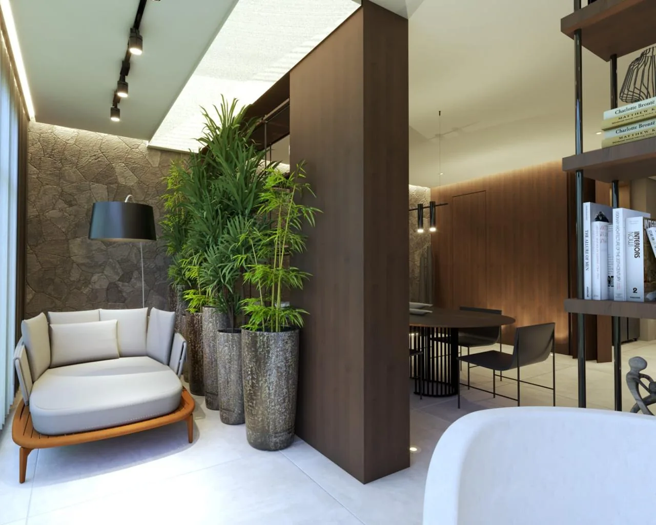 Poltrona branca com plantas e luminária pendente